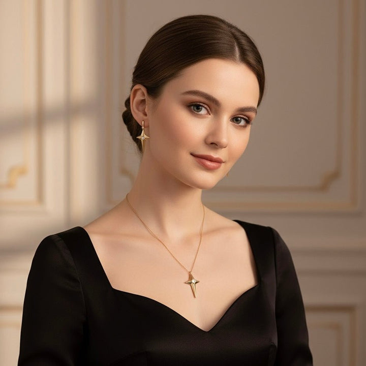 Caelis – Collana in acciaio placcato oro 18K con pendente Stella Polare e zircone - Duestelle Italia