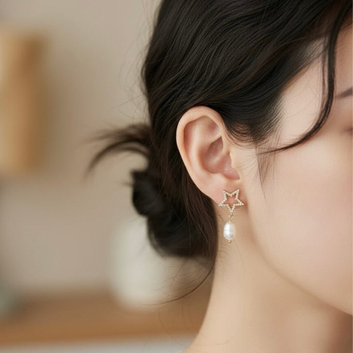 Solyne — Orecchini stella con perla naturale di fiume - Duestelle Italia