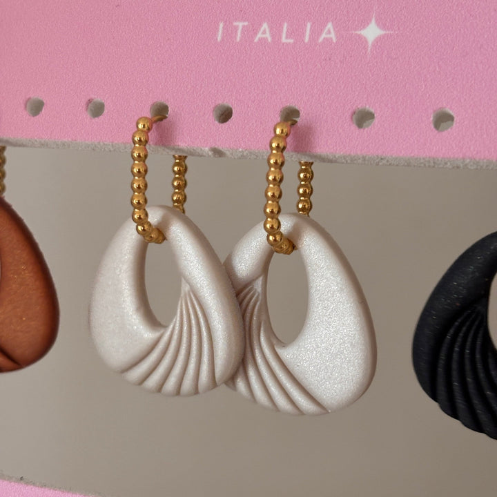 Urban Flow - Orecchini contemporanei a cerchio in acciaio placcato oro - Duestelle Italia